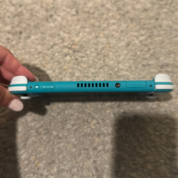 Teal Nintendo Switch Lite with matching Nintendo Animal Crossing Carrying Case - Picture 2 of 7